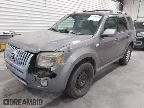 2008 Mercury Mariner Premier z VIN 4M2CU87108KJ15433, wystawiony jako IAAI lot #41924055 z przebiegiem 168 569 mil mil oraz . Historia ofert i sprzedaży dostępna na DreamBid. Obrazek 2.