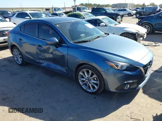2015 Mazda 3 S Grand Touring with VIN JM1BM1W31F1229357, listed as a IAAI auction lot 41229148 with 97,847 mi miles and . Bid and sale history available at DreamBid. Image 1.