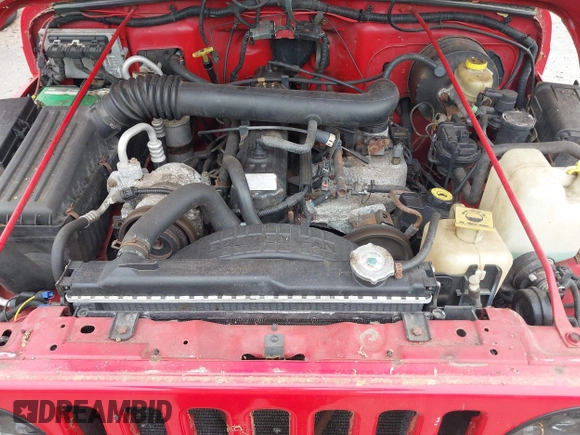 1999 Jeep Wrangler Sport z VIN 1J4FY19S0XP482218, wystawiony jako IAAI lot #42374995 z przebiegiem 149 216 mil mil oraz . Historia ofert i sprzedaży dostępna na DreamBid. Obrazek 10.