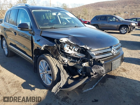 2014 Volkswagen Tiguan S z VIN WVGBV3AX4EW581302, wystawiony jako IAAI lot #41033175 z przebiegiem 69 791 mil mil oraz . Historia ofert i sprzedaży dostępna na DreamBid. Obrazek 6.