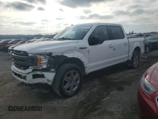 2018 Ford F-150 XL with VIN 1FTEW1E57JKE06779, listed as a Copart auction lot 84183014 with 198,203 mi miles and Salvage Title. Bid and sale history available at carsss.com. Image 1.