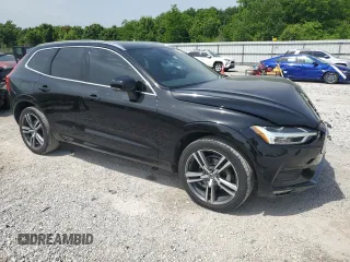 2018 Volvo XC60 Momentum with VIN LYV102RK6JB083622, listed as a Copart auction lot 56909505 with 89,197 mi miles and Salvage title. Bid and sale history available at DreamBid. Image 4.