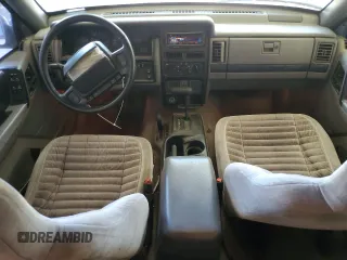 1995 Jeep Grand Cherokee Laredo with VIN 1J4GZ58Y0SC572757, listed as a Copart auction lot 52733375 with 160,588 mi miles and Salvage Title. Bid and sale history available at carsss.com. Image 8.