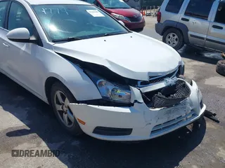 2014 Chevrolet Cruze 1LT with VIN 1G1PC5SB4E7354774, listed as a IAAI auction lot 42104388 with 136,532 mi miles and . Bid and sale history available at DreamBid. Image 16.