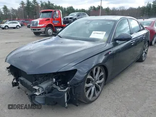 2013 Audi A6 Prestige with VIN WAUHGAFC9DN059480, listed as a IAAI auction lot 41986035 with 142,511 mi miles and . Bid and sale history available at DreamBid. Image 2.