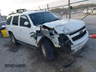 2011 Chevrolet Tahoe LS with VIN 1GNSCAE01BR131295, listed as a IAAI auction lot 40963199 with 291,482 mi miles and . Bid and sale history available at DreamBid. Image 1.
