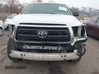 2012 Toyota Tundra z VIN 5TFUM5F11CX039386, wystawiony jako IAAI lot #41472576 z przebiegiem 213 295 mil mil oraz . Historia ofert i sprzedaży dostępna na DreamBid. Obrazek 6.