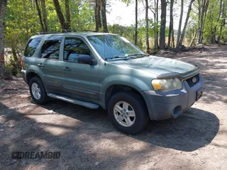 2007 Ford Escape XLS with VIN 1FMCU92ZX7KA59665, listed as a IAAI auction lot 42124248 with 169,211 mi miles and . Bid and sale history available at DreamBid. Image 1.