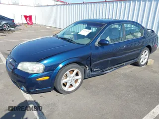 2003 Nissan Maxima SE z VIN JN1DA31D03T516575, wystawiony jako IAAI lot #42153623 z przebiegiem 176 446 mil mil oraz . Historia ofert i sprzedaży dostępna na DreamBid. Obrazek 2.
