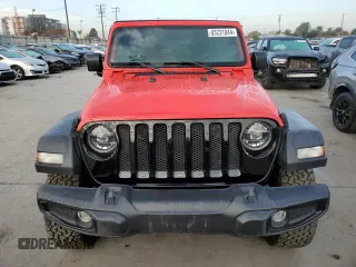 2022 Jeep Wrangler Unlimited High Tide with VIN 1C4HJXDG5NW107100, listed as a Copart auction lot 83231044 with 37,898 mi miles and Salvage Title. Bid and sale history available at DreamBid. Image 5.