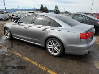 2013 Audi S6 Prestige z VIN WAUF2AFC8DN109016, wystawiony jako Copart lot #53958935 z przebiegiem 70 742 mil mil oraz Tytuł czysty. Historia ofert i sprzedaży dostępna na DreamBid. Obrazek 2.