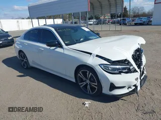 2021 BMW 3 Series 330i with VIN 3MW5R1J08M8B89327, listed as a IAAI auction lot 41655721 with 22,064 mi miles. Bid and sale history available at carsss.com. Image 1.