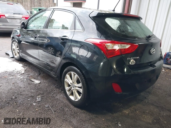 2014 Hyundai Elantra GT with VIN KMHD35LH5EU171863, listed as a IAAI auction lot 41299174 with 89,090 mi miles. Bid and sale history available at carsss.com. Image 3.