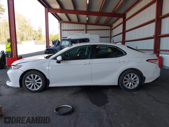 2020 Toyota Camry LE with VIN 4T1C11AK9LU935025, listed as a IAAI auction lot 42054033 with 63,814 mi miles and . Bid and sale history available at carsss.com. Image 14.