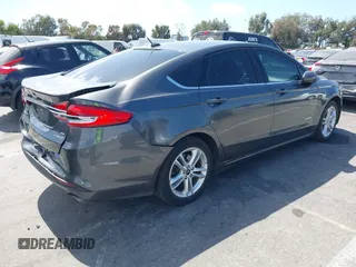2018 Ford Fusion Hybrid SE with VIN 3FA6P0LU4JR261594, listed as a IAAI auction lot 40360797 with 128,533 mi miles. Bid and sale history available at carsss.com. Image 4.