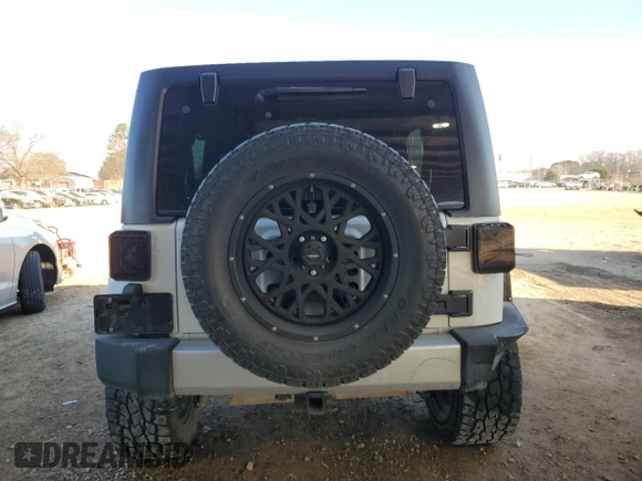 2014 Jeep Wrangler Unlimited Sahara with VIN 1C4BJWEG0EL305955, listed as a Copart auction lot 46539355 with 108,020 mi miles and Salvage Title. Bid and sale history available at carsss.com. Image 6.