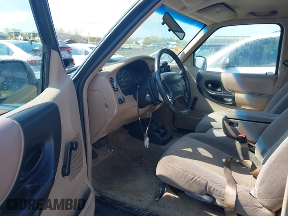1998 Mazda B-Series Truck SX with VIN 4F4YR12C4WTM03287, listed as a IAAI auction lot 42182560 with 94,609 mi miles and . Bid and sale history available at DreamBid. Image 8.