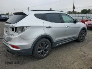 2018 Hyundai Santa Fe Ultimate с VIN 5XYZW4LA5JG513869, выставлен на аукционе Copart как лот 54176545 с пробегом 150 286 миль миль и Списание • Salvage title. История ставок и продаж доступна на DreamBid. Изображение 3.