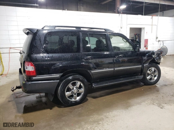 2006 Toyota Land Cruiser with VIN JTEHT05J962083450, listed as a Copart auction lot 51628905 with 264,486 mi miles and Salvage Title. Bid and sale history available at carsss.com. Image 3.