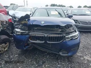 2019 BMW 3 Series 330i xDrive with VIN WBA5R7C59KAJ83727, listed as a IAAI auction lot 42244312 with 69,680 mi miles and . Bid and sale history available at DreamBid. Image 12.