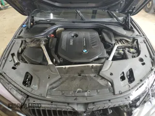2018 BMW 5 Series 540i xDrive z VIN WBAJE7C59JWC56481, wystawiony jako Copart lot #50831085 z przebiegiem 105 558 mil mil oraz Szkoda całkowita • Salvage title. Historia ofert i sprzedaży dostępna na DreamBid. Obrazek 13.
