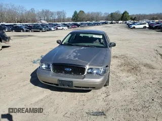 2005 Ford Police Interceptor z VIN 2FAFP71W15X156970, wystawiony jako Copart lot #48757325 z przebiegiem 187 004 mil mil oraz Czysty tytuł • Clean title. Historia ofert i sprzedaży dostępna na DreamBid. Obrazek 10.