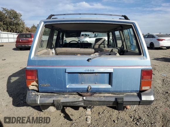 1991 Jeep Cherokee with VIN 1J4FJ58S1ML520376, listed as a Copart auction lot 75452364 with 147,982 mi miles and Salvage title. Bid and sale history available at DreamBid. Image 6.