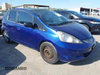 2009 Honda Fit with VIN JHMGE88279S071667, listed as a IAAI auction lot 42035664 with 235,791 mi miles. Bid and sale history available at carsss.com. Image 1.