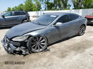2014 Tesla Model S 60 with VIN 5YJSA1H13EFP36058, listed as a Copart auction lot 57041725 with Not provided miles and Salvage title. Bid and sale history available at DreamBid. Image 1.