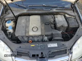 2007 Volkswagen Rabbit z VIN WVWCS71K27W117036, wystawiony jako Copart lot #80883524 z przebiegiem 162 217 mil mil oraz Szkoda całkowita • Salvage title. Historia ofert i sprzedaży dostępna na DreamBid. Obrazek 11.