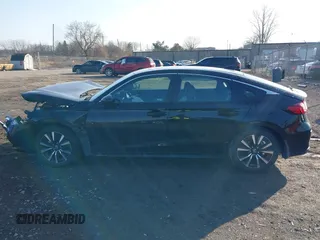 2024 Honda Civic EX-L z VIN 19XFL1H73RE014164, wystawiony jako IAAI lot #38823542 z przebiegiem 3 mil mil oraz . Historia ofert i sprzedaży dostępna na DreamBid. Obrazek 14.