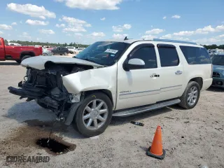 2009 GMC Yukon XL Denali with VIN 1GKFK062X9R296347, listed as a Copart auction lot 73412054 with 166,867 mi miles and Salvage Title. Bid and sale history available at carsss.com. Image 1.