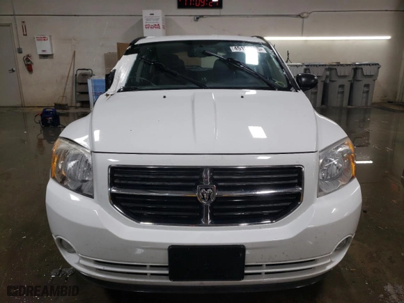 2011 Dodge Caliber Mainstreet with VIN 1B3CB3HA5BD261790, listed as a Copart auction lot 45127715 with 84,780 mi miles and Salvage Title. Bid and sale history available at carsss.com. Image 5.