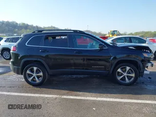 2022 Jeep Cherokee Limited with VIN 1C4PJMDX1ND520783, listed as a IAAI auction lot 41989564 with 55,947 mi miles and . Bid and sale history available at DreamBid. Image 14.