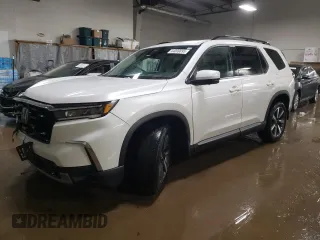 2023 Honda Pilot Elite with VIN 5FNYG1H89PB005675, listed as a Copart auction lot 44009895 with 35,514 mi miles and Salvage Title. Bid and sale history available at carsss.com. Image 1.