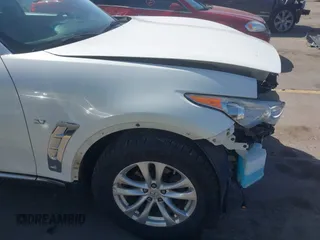 2014 Infiniti QX70 with VIN JN8CS1MW7EM413033, listed as a IAAI auction lot 41993136 with 148,838 mi miles and . Bid and sale history available at DreamBid. Image 18.