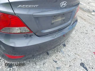 2014 Hyundai Accent GLS with VIN KMHCT4AE6EU670895, listed as a IAAI auction lot 42197066 with 142,983 mi miles and . Bid and sale history available at carsss.com. Image 13.