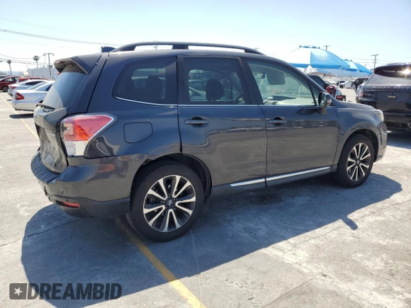 2017 Subaru Forester Touring with VIN JF2SJGWC1HH476823, listed as a Copart auction lot 59230835 with 107,711 mi miles and Salvage title. Bid and sale history available at DreamBid. Image 3.