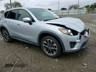 2016 Mazda CX-5 Grand Touring with VIN JM3KE2DY2G0894056, listed as a Copart auction lot 49247815 with 56,039 mi miles and Salvage Title. Bid and sale history available at carsss.com. Image 12.