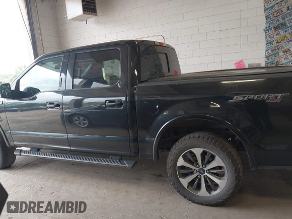 2015 Ford F-150 XLT with VIN 1FTEW1EPXFKE99354, listed as a IAAI auction lot 42245005 with 160,164 mi miles and . Bid and sale history available at DreamBid. Image 14.