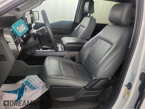 2023 Ford F-150 Lightning Pro z VIN 1FTVW1EL0PWG02840, wystawiony jako IAAI lot #42379448 z przebiegiem 52 710 mil mil oraz . Historia ofert i sprzedaży dostępna na DreamBid. Obrazek 27.