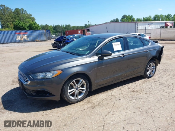 2018 Ford Fusion SE z VIN 3FA6P0H71JR155221, wystawiony jako IAAI lot #42145081 z przebiegiem 189 367 mil mil oraz . Historia ofert i sprzedaży dostępna na DreamBid. Obrazek 18.