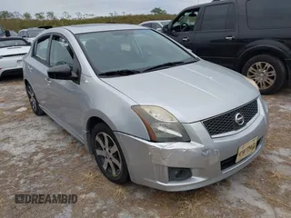 2012 Nissan Sentra S z VIN 3N1AB6AP9CL763500, wystawiony jako IAAI lot #40502928 z przebiegiem Nie podano mil oraz . Historia ofert i sprzedaży dostępna na DreamBid. Obrazek 1.