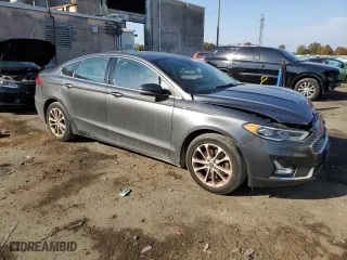 2020 Ford Fusion Plug-In Hybrid Titanium with VIN 3FA6P0SU5LR230939, listed as a Copart auction lot 77899134 with 104,656 mi miles and Salvage Title. Bid and sale history available at carsss.com. Image 4.