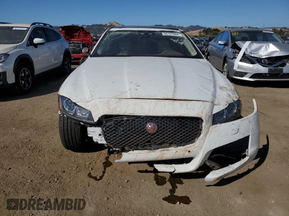 2016 Jaguar XF 35t Prestige with VIN SAJBE4BVXGCY02950, listed as a Copart auction lot 66197884 with 51,616 mi miles and Salvage Title. Bid and sale history available at carsss.com. Image 5.