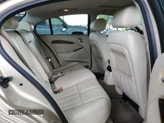 2003 Jaguar S-Type z VIN SAJEA01U53HM58399, wystawiony jako Copart lot #62006044 z przebiegiem 86 841 mil mil oraz Szkoda całkowita • Salvage title. Historia ofert i sprzedaży dostępna na DreamBid. Obrazek 10.