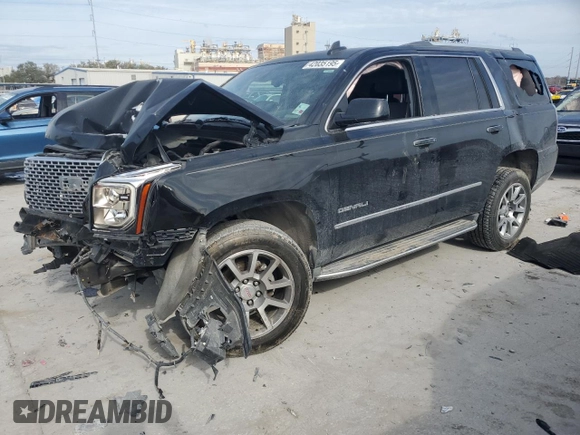 2015 GMC Yukon Denali with VIN 1GKS1CKJ2FR699959, listed as a Copart auction lot 42035195 with 0 mi miles and Salvage Title. Bid and sale history available at carsss.com. Image 1.