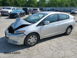 2010 Honda Insight LX with VIN JHMZE2H5XAS002122, listed as a Copart auction lot 60365485 with 307,485 mi miles and Salvage title. Bid and sale history available at DreamBid. Image 1.