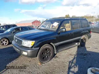 2000 Toyota Land Cruiser with VIN JT3HT05J7Y0110667, listed as a IAAI auction lot 41248220 with 208,043 mi miles. Bid and sale history available at carsss.com. Image 2.