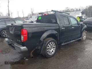2011 Nissan Frontier Pro-4X with VIN 1N6AD0EV5BC440663, listed as a IAAI auction lot 41923918 with 168,331 mi miles and . Bid and sale history available at DreamBid. Image 4.